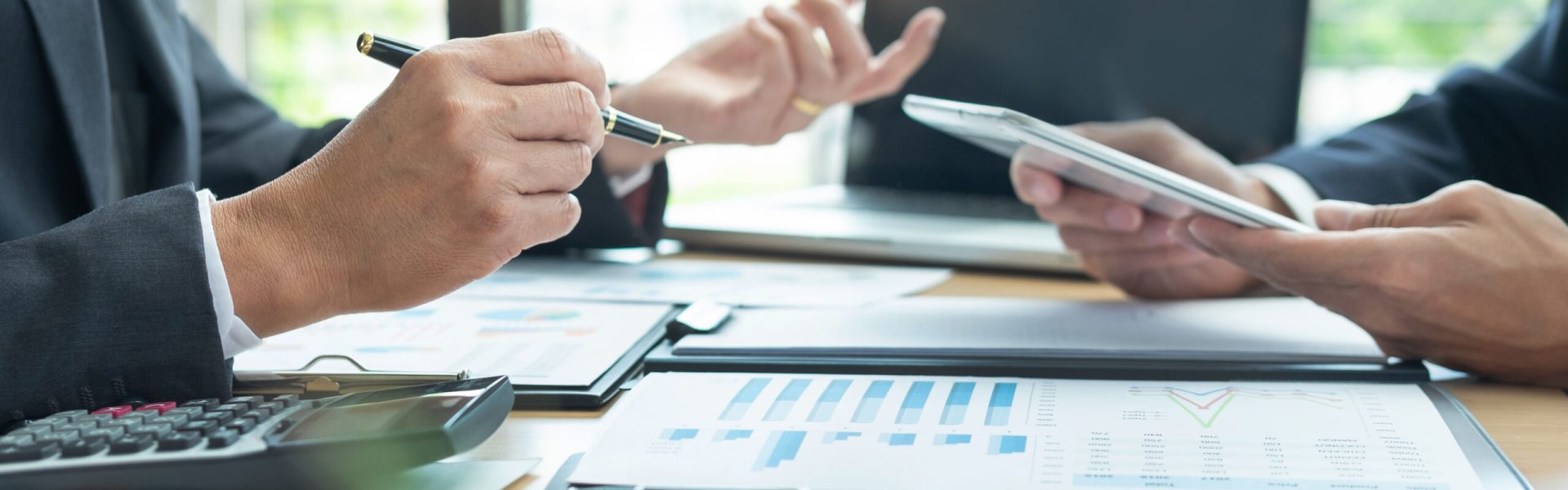 Business People Talking Discussing with coworker planning analyzing financial document data charts and graphs in Meeting and  successful teamwork Concept